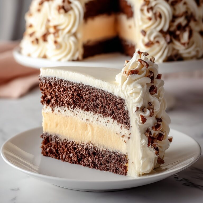 White German Chocolate Cake with a Cheesecake Center Recipe