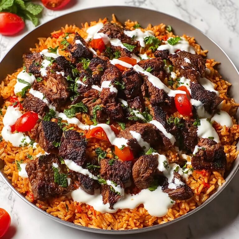 Creamy Queso Rice with Juicy Steak Strips Recipe