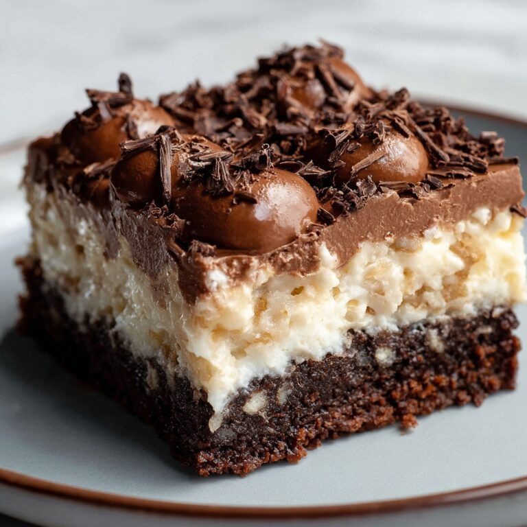 German Chocolate Poke Cake with Caramel, Coconut, and Pecans Recipe